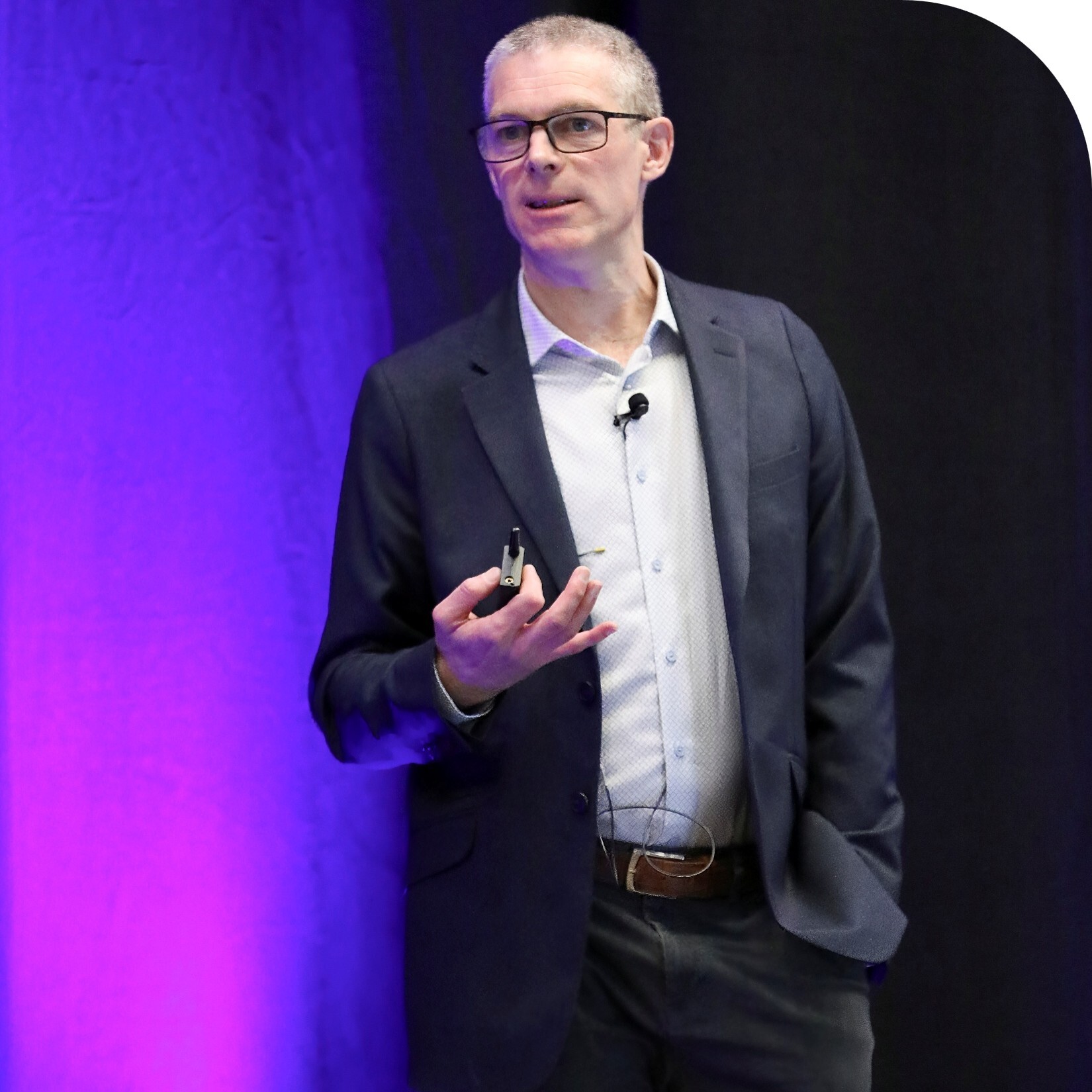 James Wheatley presenting on stage 