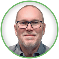 George Hughes headshot in green circle and white background