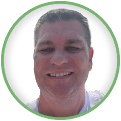Brian Connelly headshot in green circle and white background