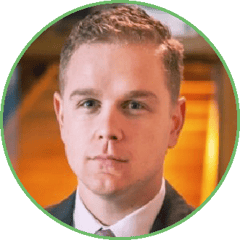 Kevin Wynne headshot in green circle and white background