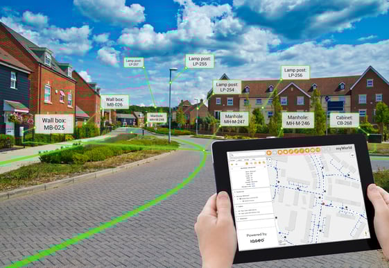 IQGeo myWorld being used in the field on a tablet