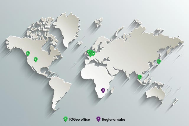 World map with green pins to indicate the IQGeo office locations and a purple pin for the Regional sales location